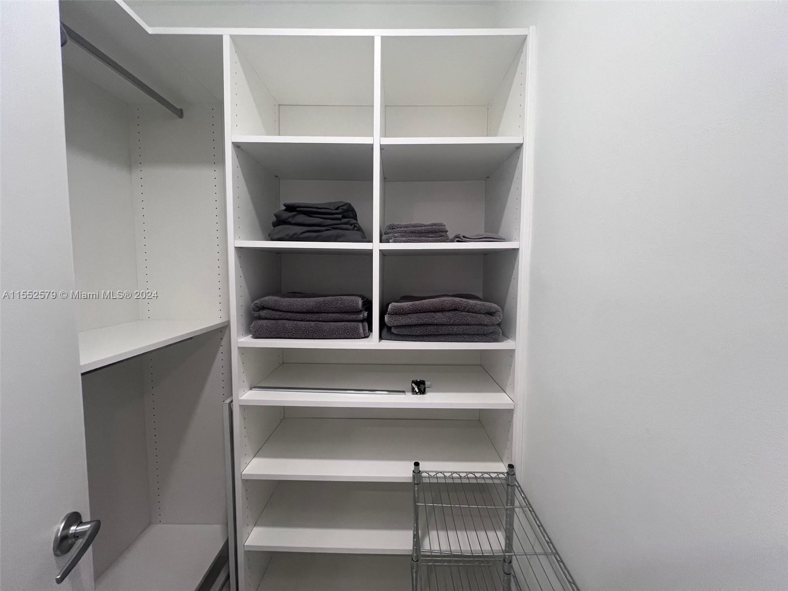 100 Lincoln Road, Unit 1536 Miami Beach, FL 33139 - Photo 8 of 18 a view of an empty walk in closet
