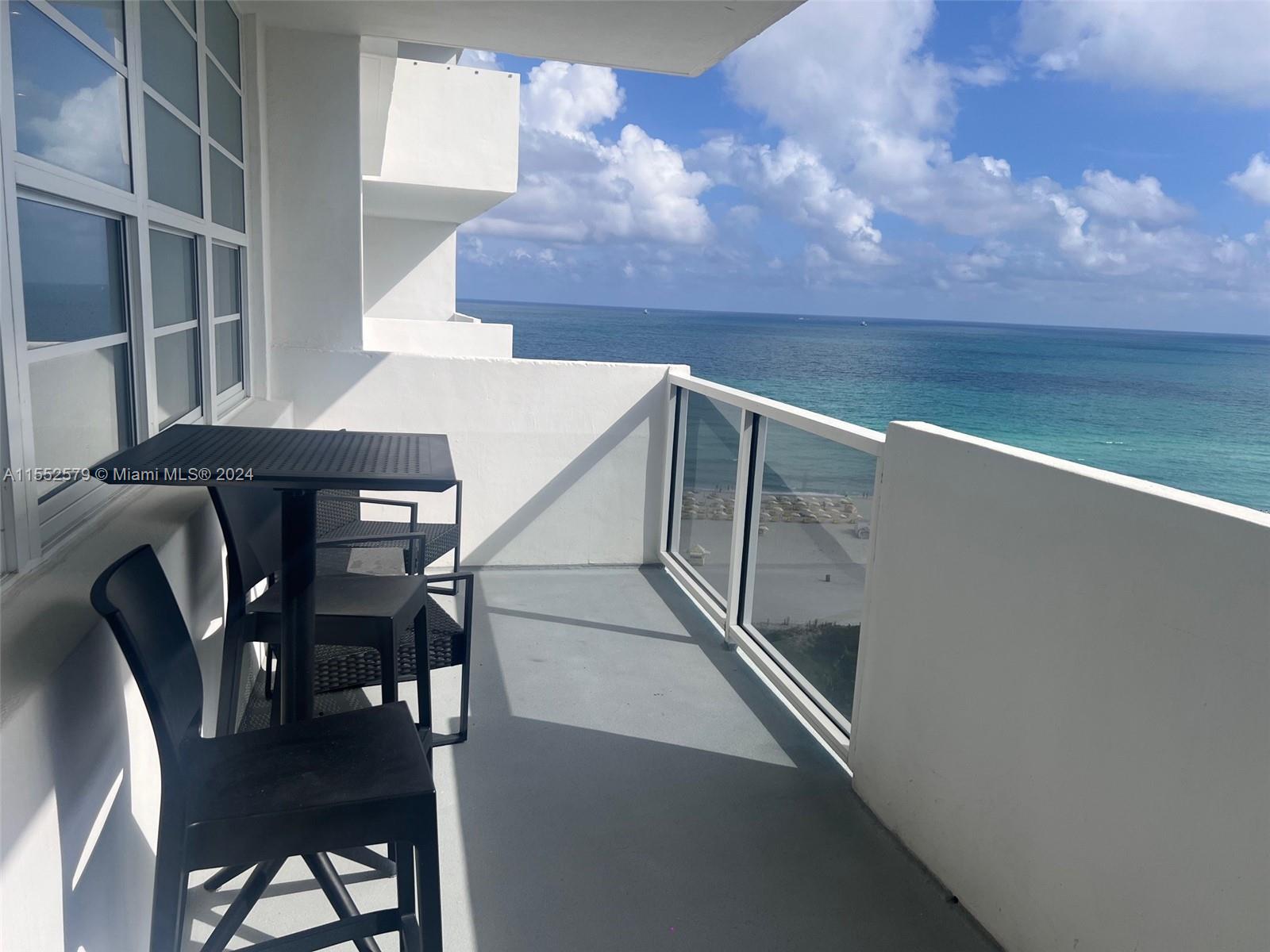100 Lincoln Road, Unit 1536 Miami Beach, FL 33139 - Photo 10 of 18 a view of entryway and hall with wooden floor