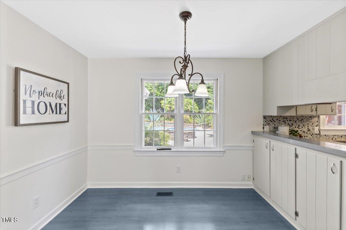 1005 Pebblebrook Drive Raleigh, NC 27609 - Photo 11 of 37 a view of a kitchen in the house