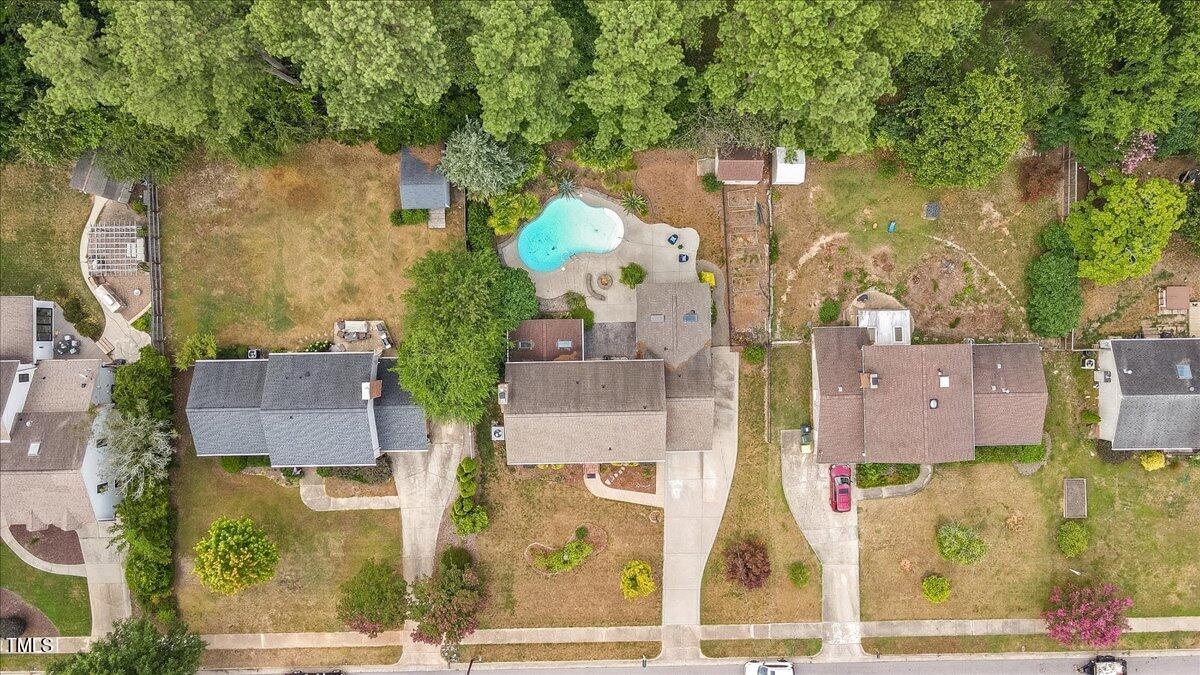 1005 Pebblebrook Drive Raleigh, NC 27609 - Photo 31 of 37 an aerial view of residential houses with outdoor space