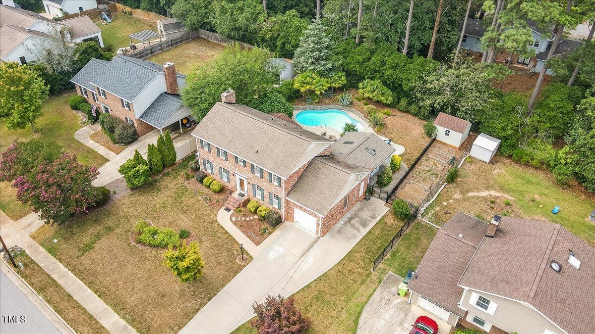 1005 Pebblebrook Drive Raleigh, NC 27609 - Photo 32 of 37 an aerial view of a house with a garden