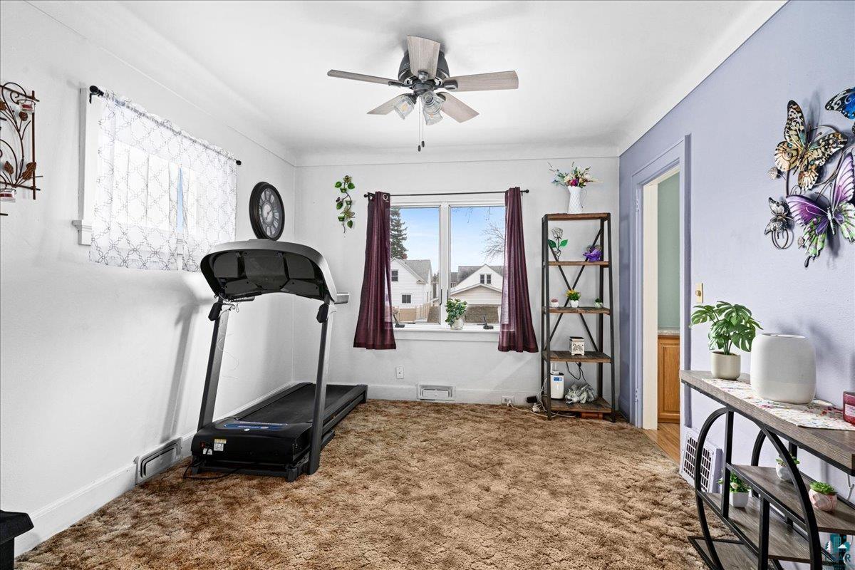4316 West 6th Street Duluth, MN 55807 - Photo 26 of 38 Exercise room featuring ceiling fan and carpet flooring