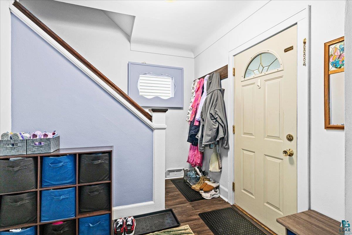 4316 West 6th Street Duluth, MN 55807 - Photo 36 of 38 Entryway featuring dark wood-style flooring and baseboards