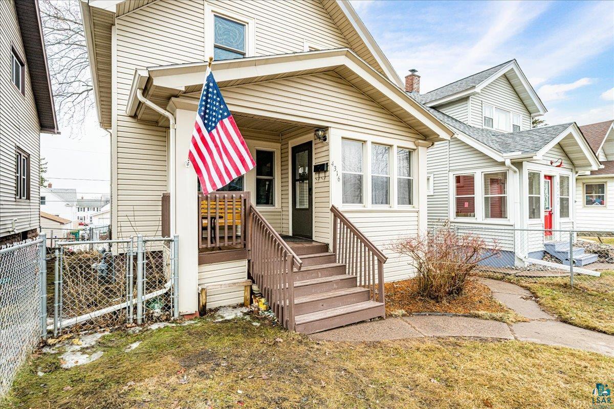 4316 West 6th Street Duluth, MN 55807 - Photo 6 of 38 View of front of house with a chimney and entry steps