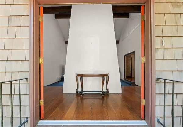 view of room with window and wooden floor