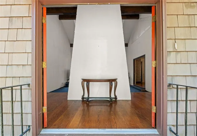 view of room with window and wooden floor