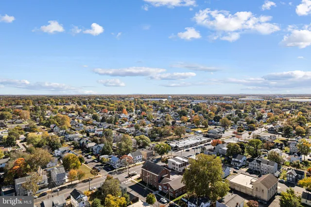 a picture of a room with a white wall and white cabinet