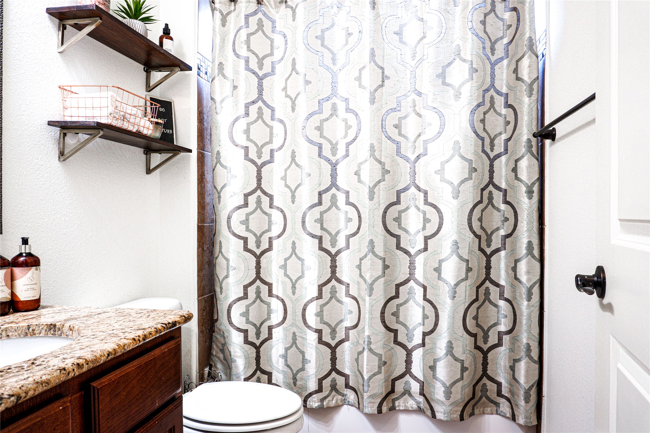 102 Indigo Run Cove Austin, TX 78738 - Photo 14 of 24 Bathroom featuring a shower with curtain and vanity