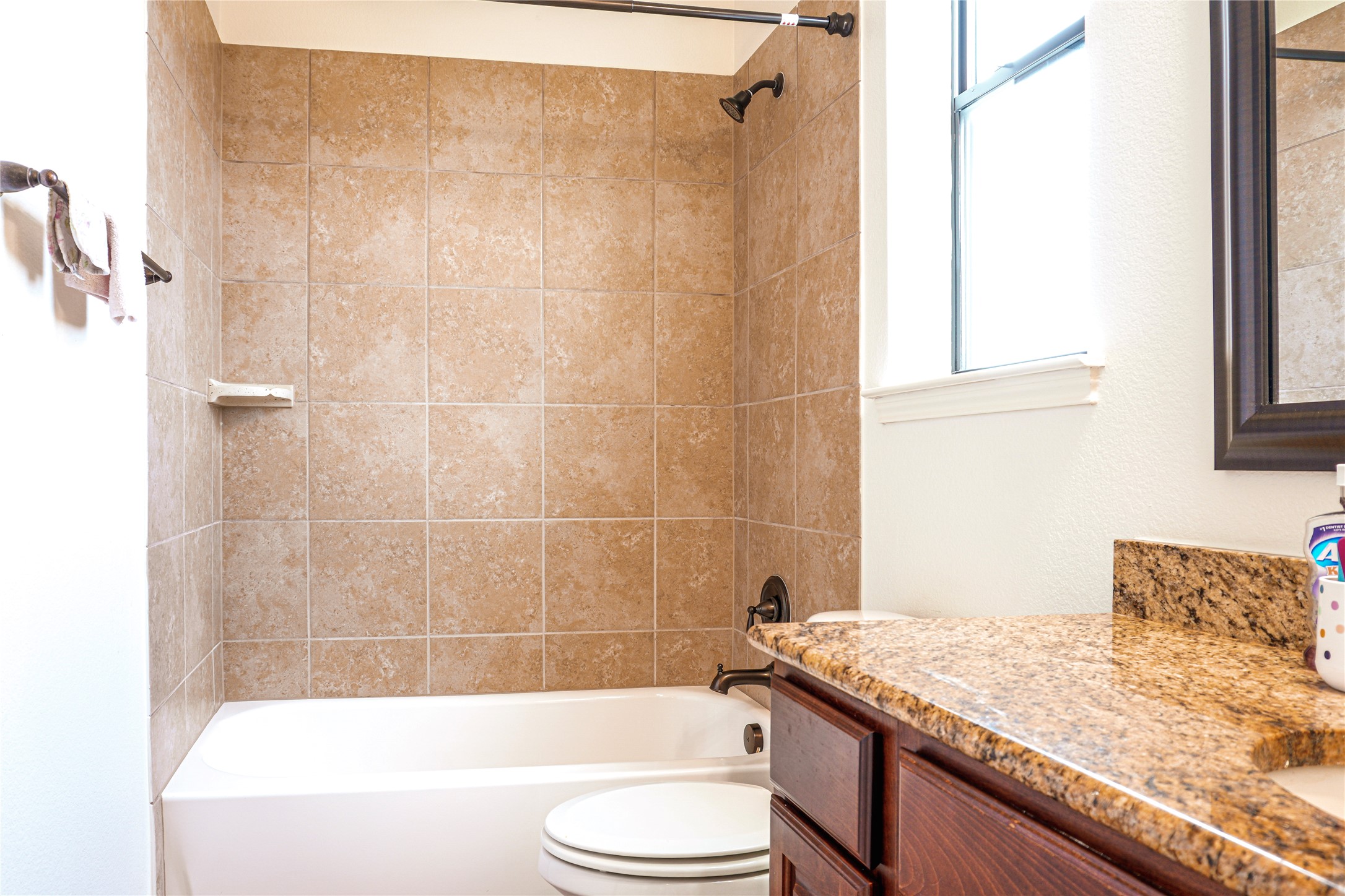 102 Indigo Run Cove Austin, TX 78738 - Photo 18 of 24 Full bath with vanity and washtub / shower combination