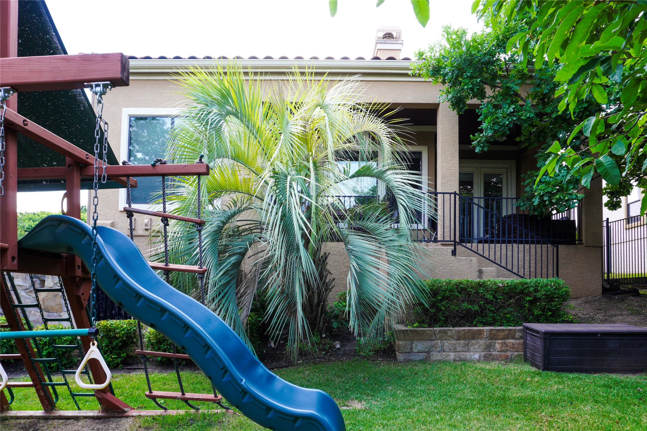 102 Indigo Run Cove Austin, TX 78738 - Photo 23 of 24 View of playground featuring a lawn