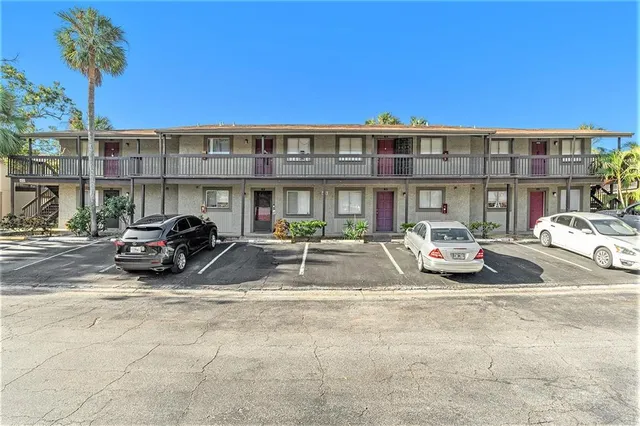 a view of a car parked in front of a building