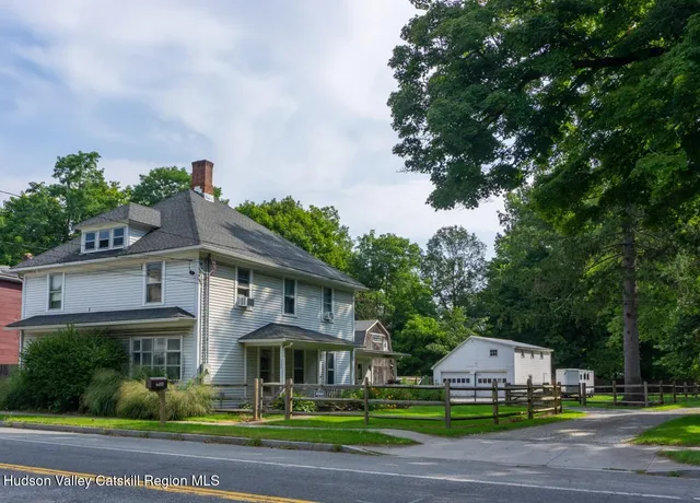 a view of a city street from a house
