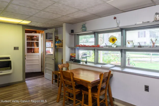 a kitchen with a sink cabinets and stainless steel appliances