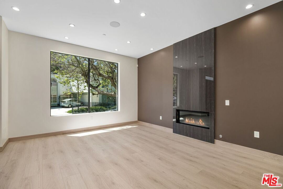 9719 Blantyre Drive Beverly Hills, CA 90210 - Photo 13 of 43 a view of livingroom with furniture and window