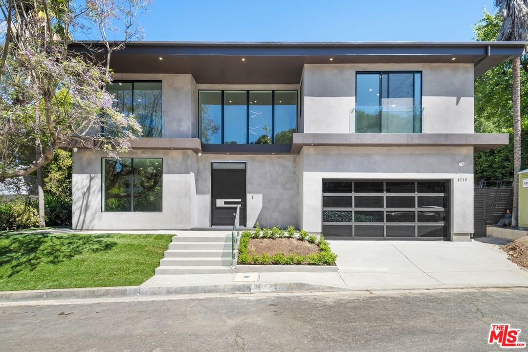 9719 Blantyre Drive Beverly Hills, CA 90210 - Photo 2 of 43 a house view with a garden space