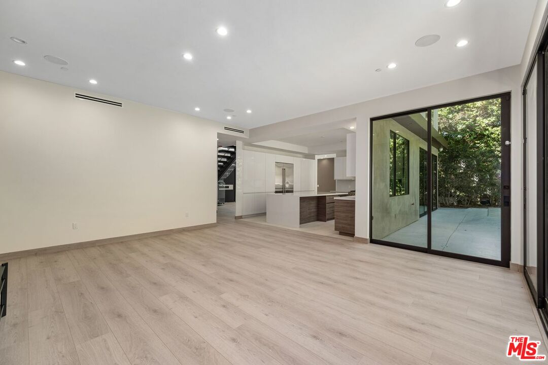 9719 Blantyre Drive Beverly Hills, CA 90210 - Photo 21 of 43 a view of an empty room with a window