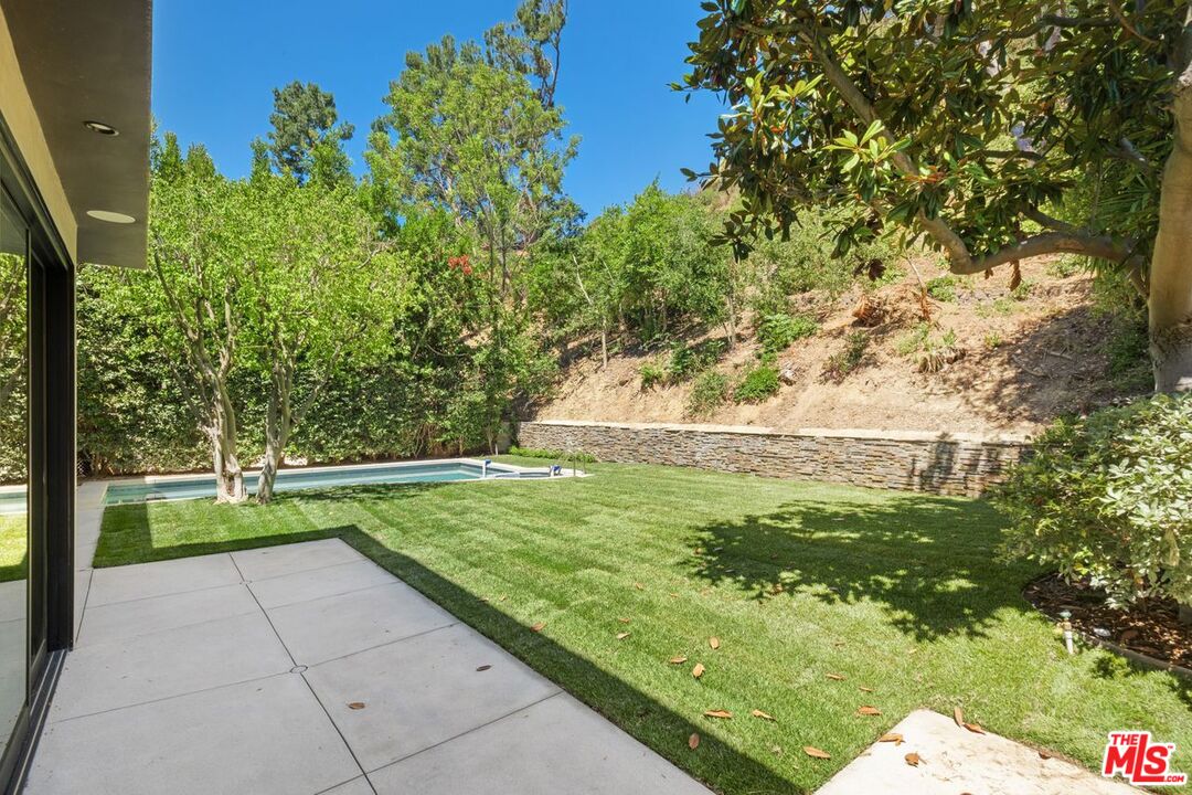 9719 Blantyre Drive Beverly Hills, CA 90210 - Photo 38 of 43 a view of a backyard