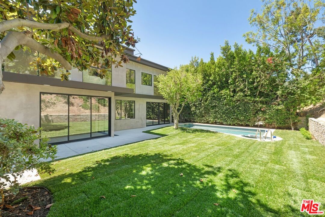 9719 Blantyre Drive Beverly Hills, CA 90210 - Photo 39 of 43 a view of pool with a backyard