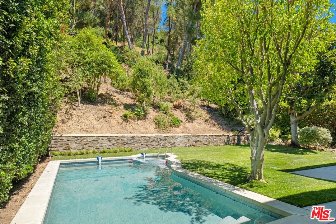9719 Blantyre Drive Beverly Hills, CA 90210 - Photo 41 of 43 a view of a yard with an outdoor seating
