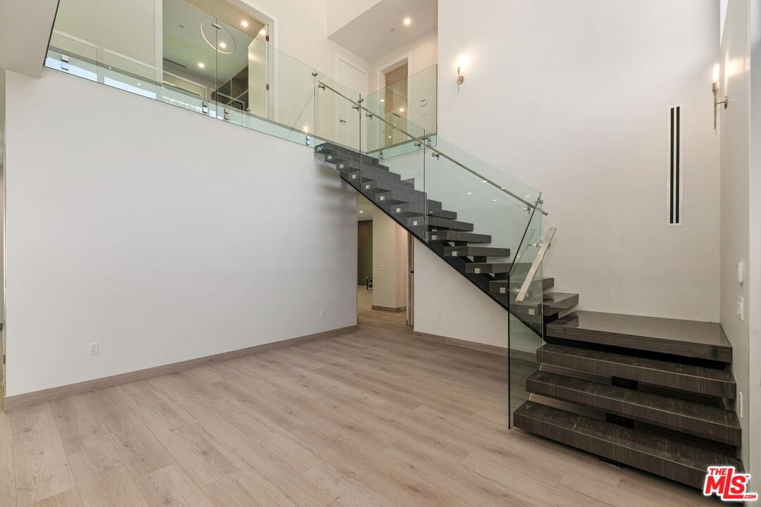 9719 Blantyre Drive Beverly Hills, CA 90210 - Photo 5 of 43 a view of entryway and hall with wooden floor