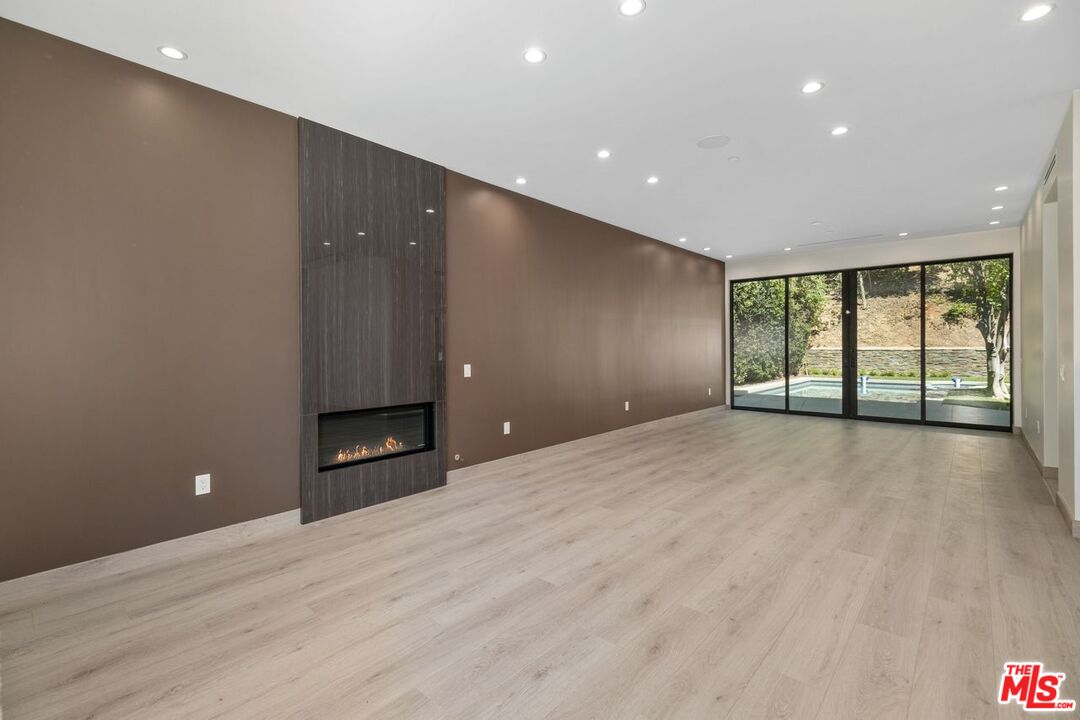 9719 Blantyre Drive Beverly Hills, CA 90210 - Photo 9 of 43 a view of an empty room with a window