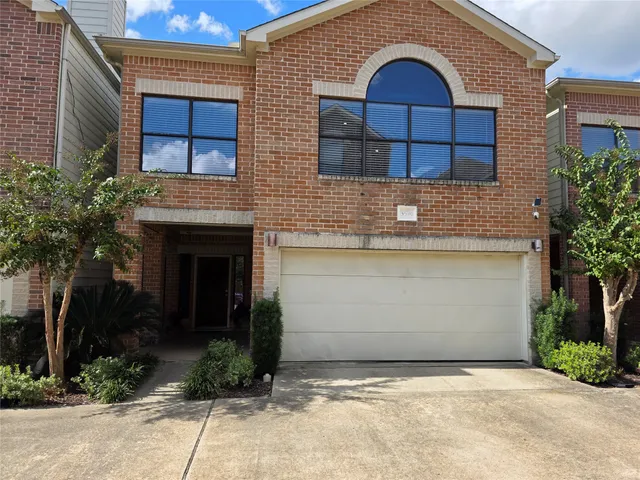 a house view with a outdoor space