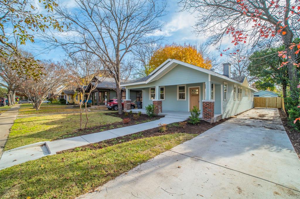 5914 Victor Street Dallas, TX 75214 - Photo 28 of 32 a front view of a house with a yard