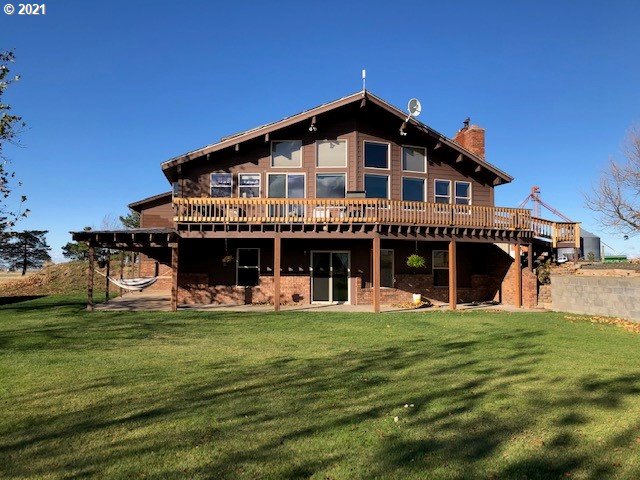 81876 Gerking Flat Road Athena, OR 97813 - Photo 1 of 30 a view of a house with a swimming pool