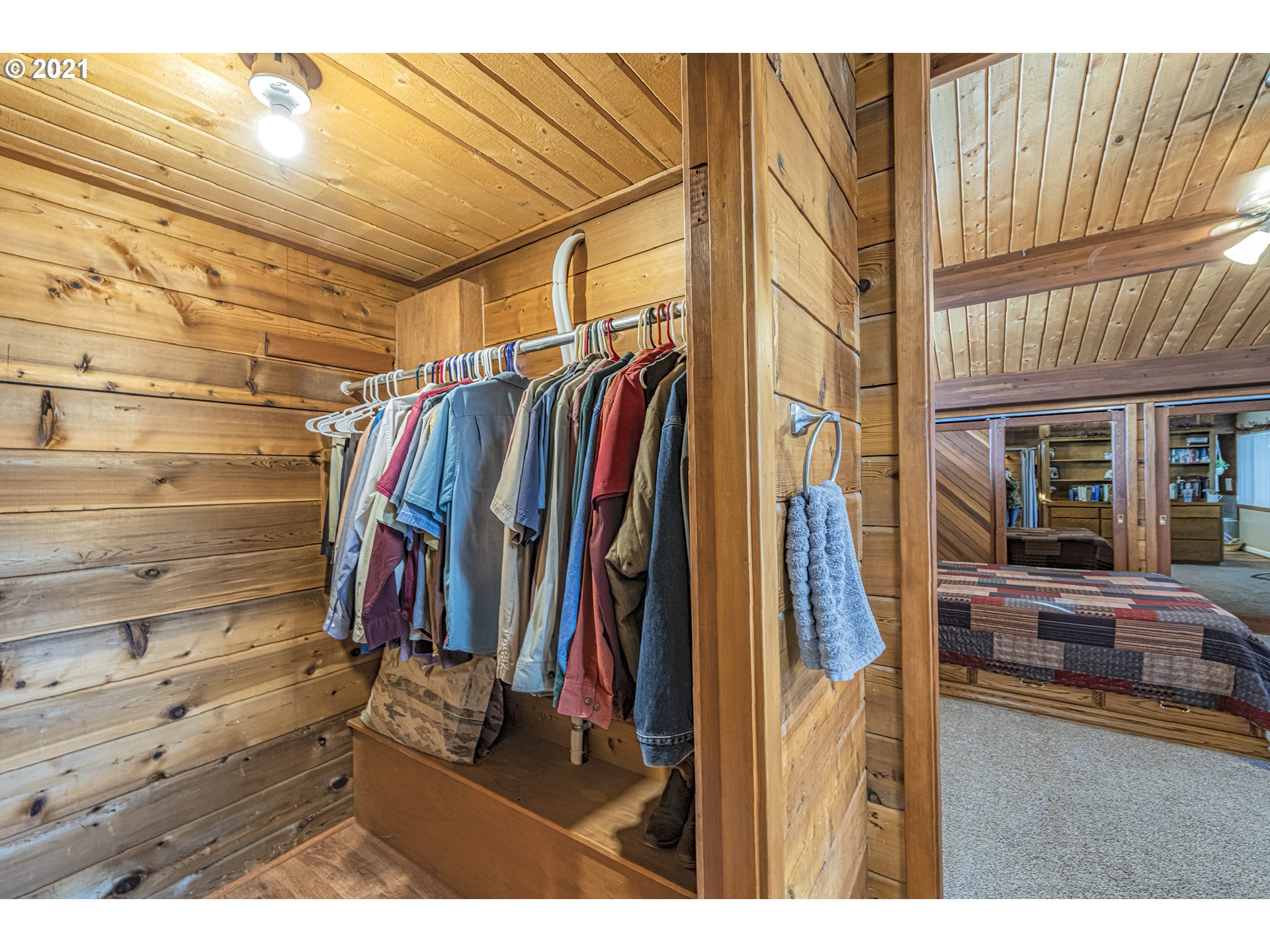 81876 Gerking Flat Road Athena, OR 97813 - Photo 14 of 30 a view of walk in closet with clothes and shoes
