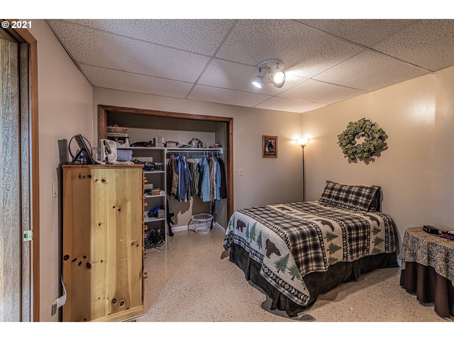 81876 Gerking Flat Road Athena, OR 97813 - Photo 18 of 30 a bedroom with bed and a walk in closet