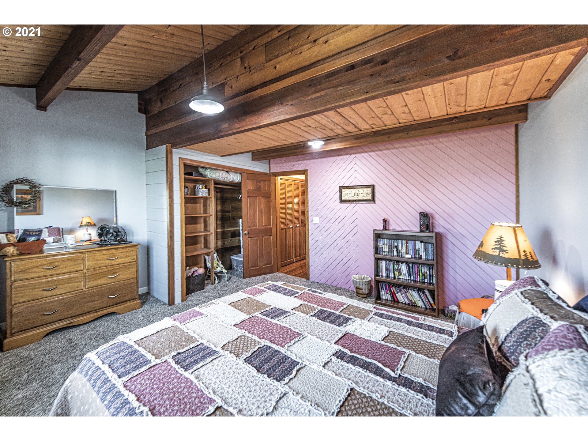 81876 Gerking Flat Road Athena, OR 97813 - Photo 20 of 30 a bedroom with a bed cabinets and a window
