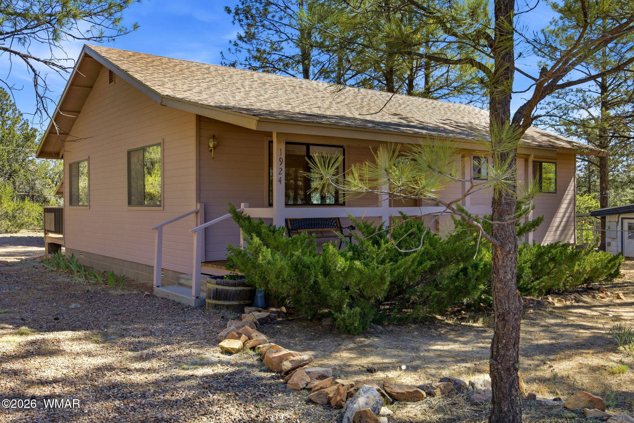 1924 Little Doe Trail Overgaard, AZ 85933 - Photo 2 of 31 a view of a pathway with a house in the background