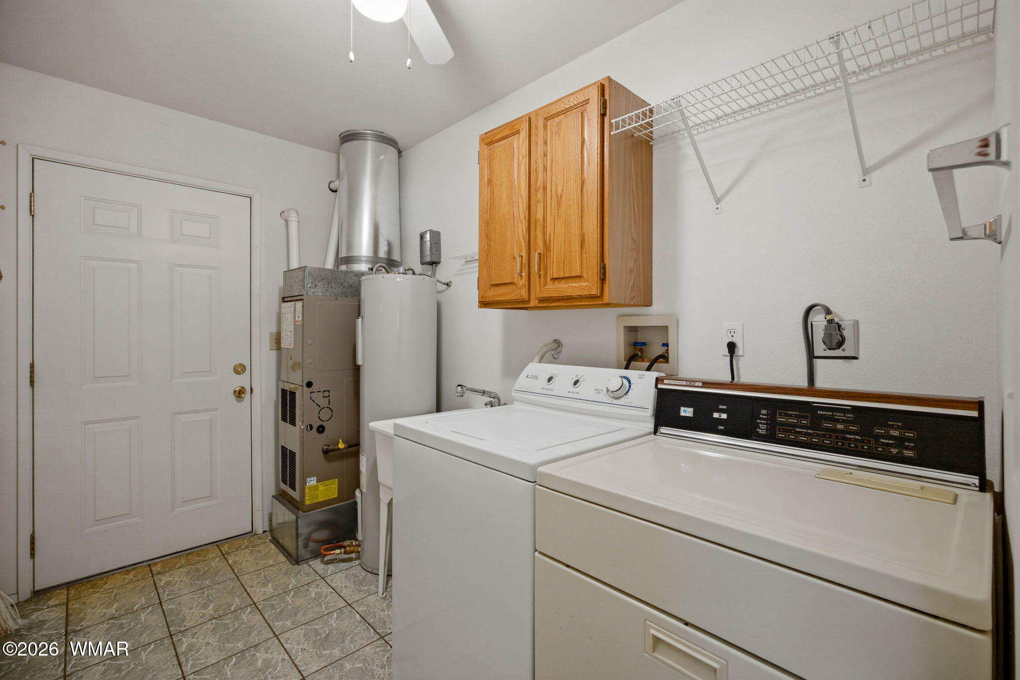 1924 Little Doe Trail Overgaard, AZ 85933 - Photo 21 of 31 a utility room with dryer and washer