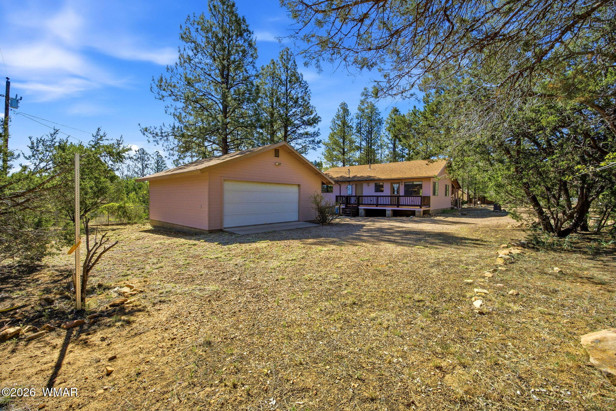 1924 Little Doe Trail Overgaard, AZ 85933 - Photo 28 of 31 a house view with a garden space