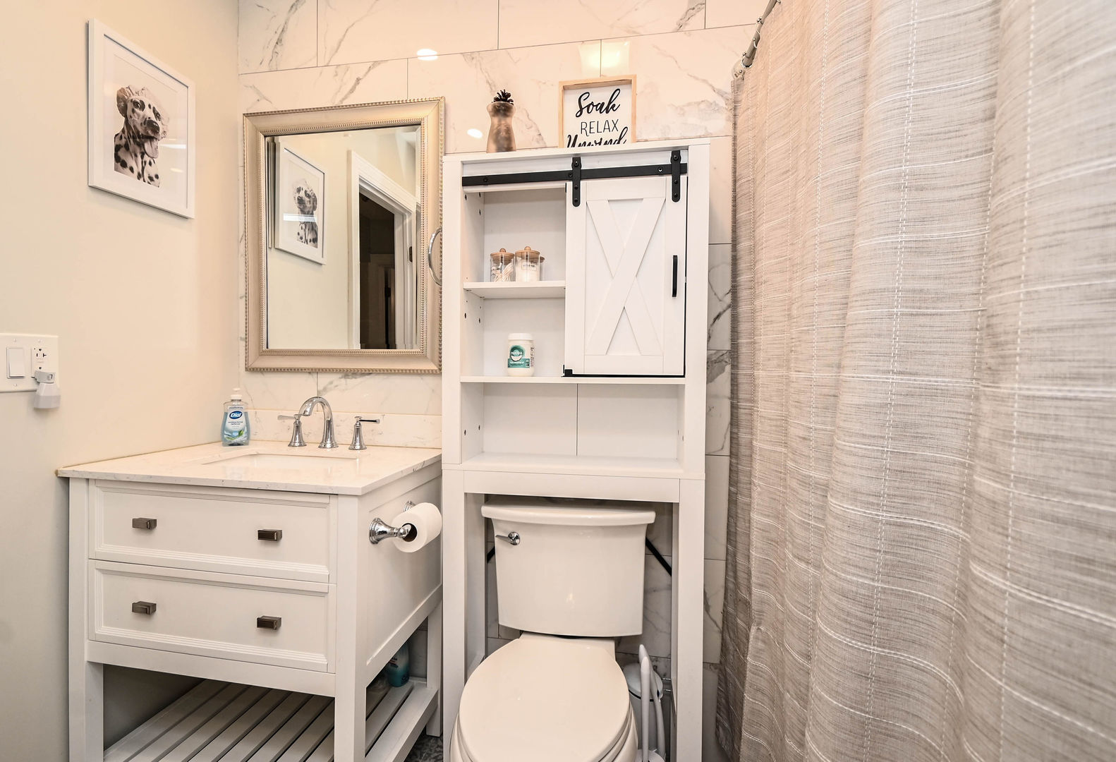 598 Dunham Road Gurnee, IL 60031 - Photo 12 of 31 a bathroom with a sink a toilet and a mirror