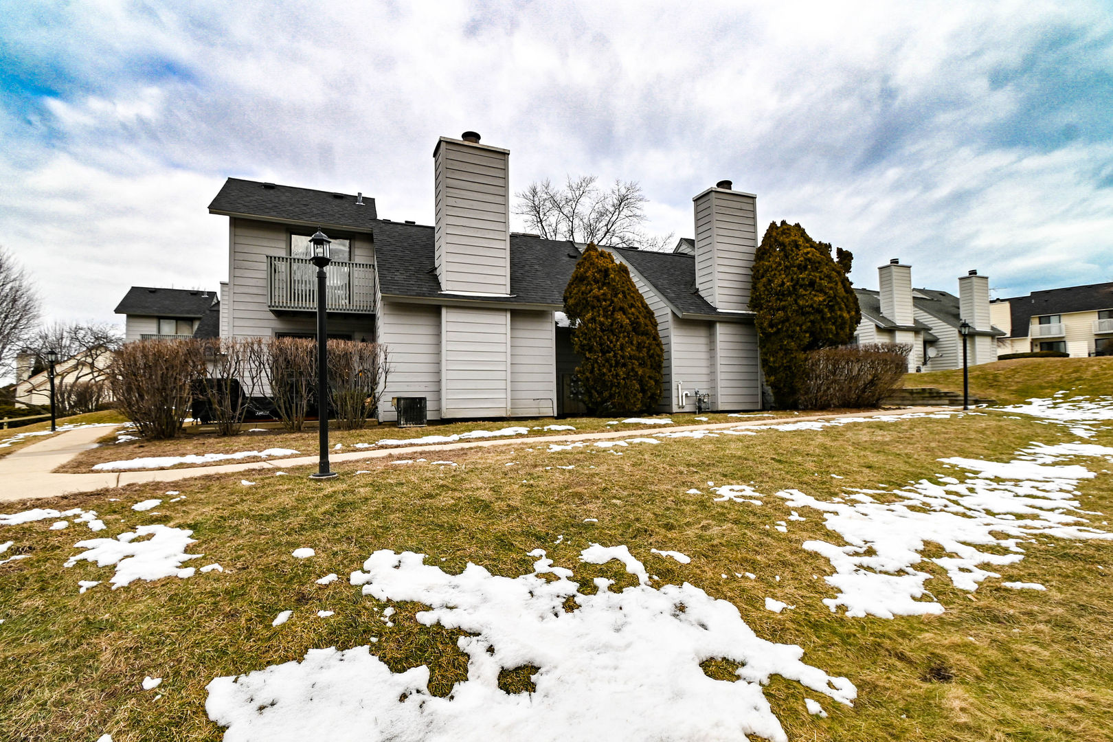 598 Dunham Road Gurnee, IL 60031 - Photo 2 of 31 a view of a street with houses