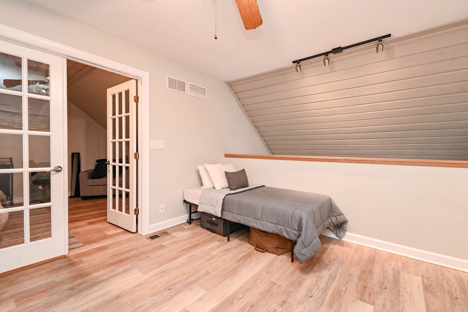 598 Dunham Road Gurnee, IL 60031 - Photo 23 of 31 a living room with a bed furniture and a window