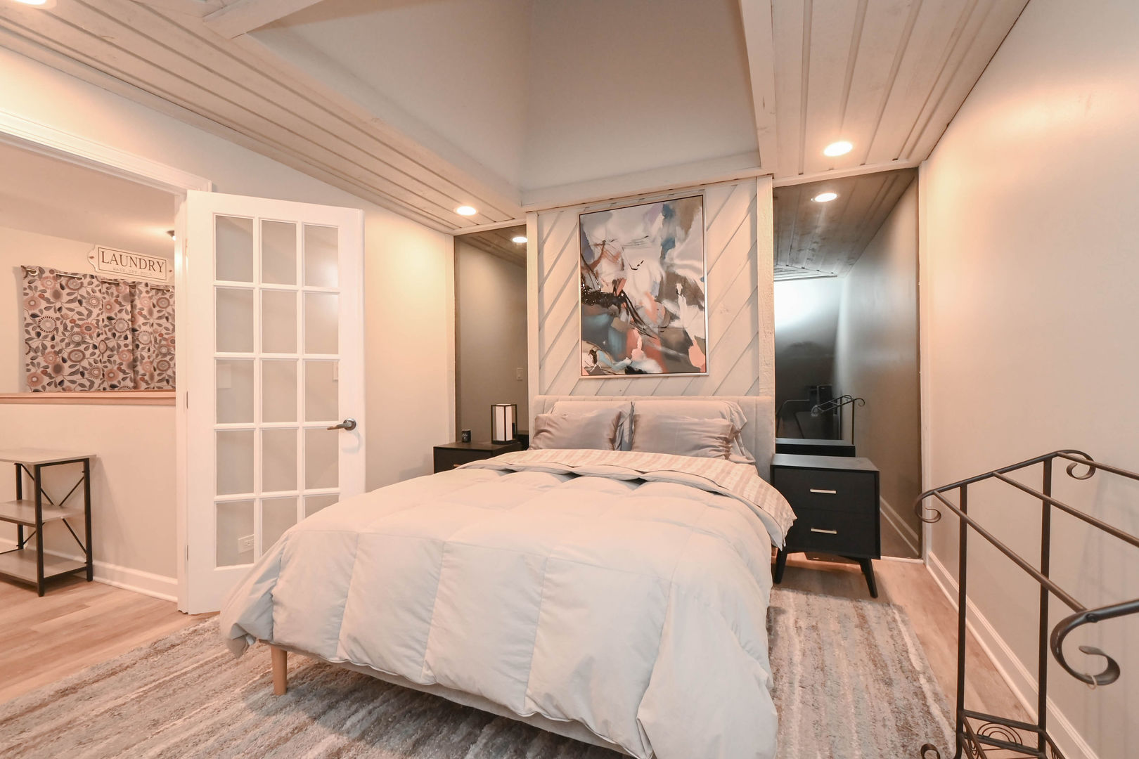 598 Dunham Road Gurnee, IL 60031 - Photo 28 of 31 a spacious bedroom with a bed and a painting on the wall