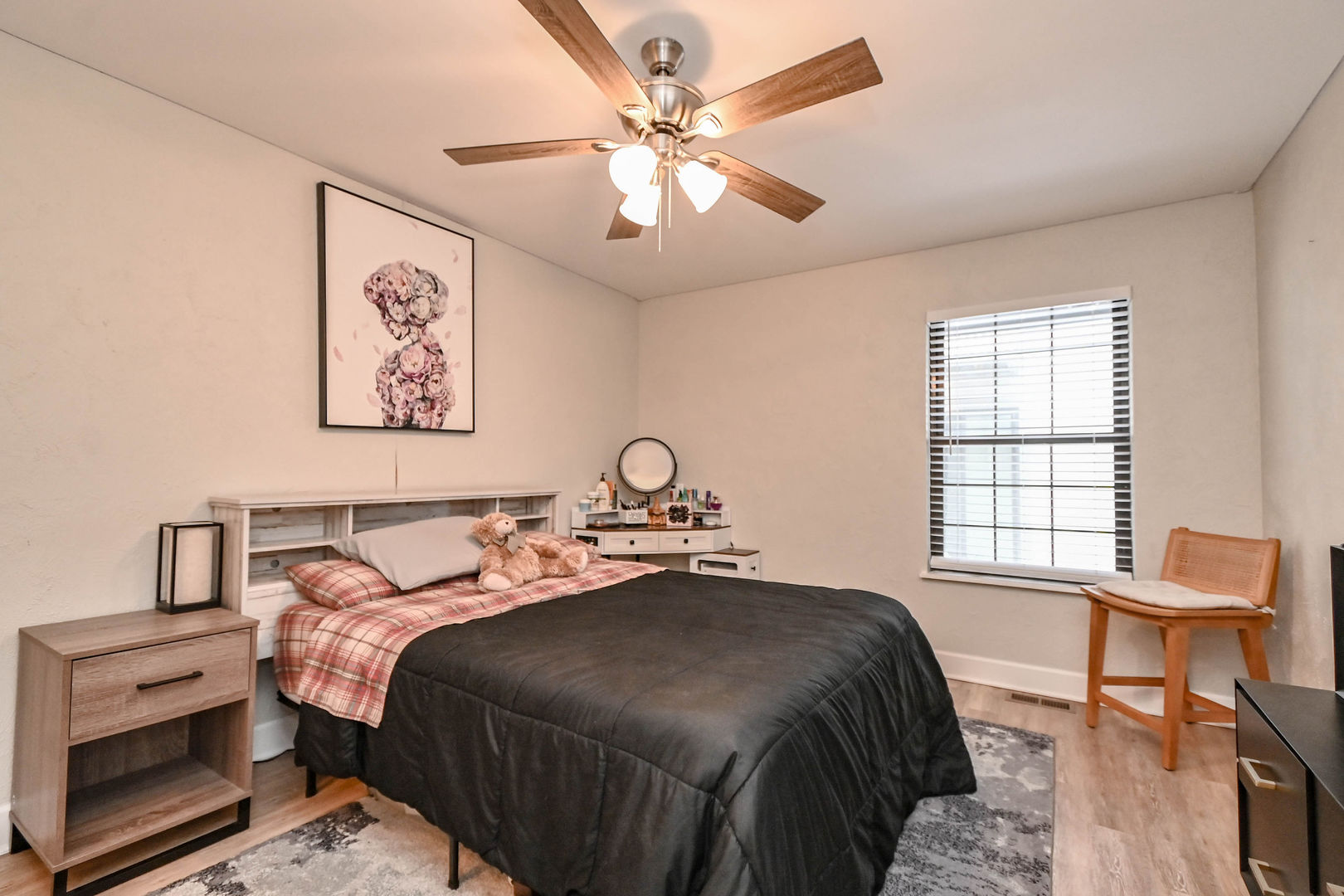 598 Dunham Road Gurnee, IL 60031 - Photo 10 of 31 a bedroom with a bed and a table with stool