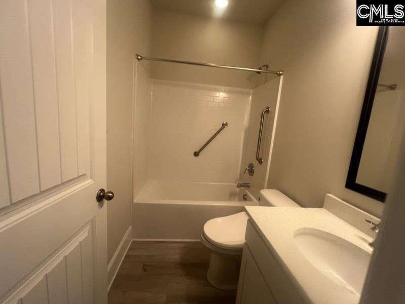 516 Mitscher Way Chapin, SC 29036 - Photo 15 of 18 a bathroom with a sink a toilet and shower