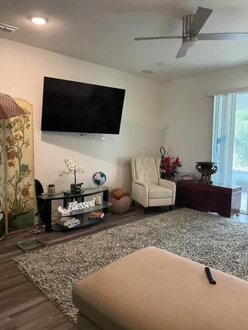 a room with a table and chairs