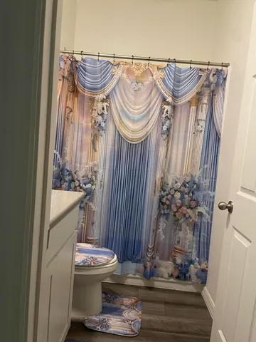 a kitchen with a table and chairs