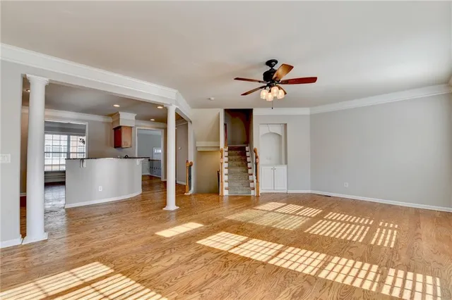 a view of a livingroom with a kitchen