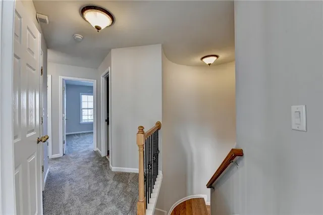 a view of a hallway with closet