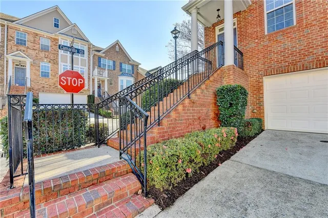 a view of a street with an outdoor space