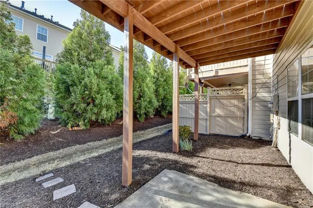 a view of a porch with wooden floor