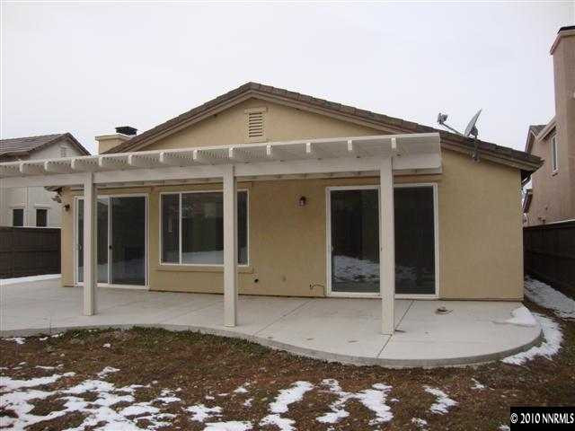 14020 Tagor Road Reno, NV 89521 - Photo 2 of 9 a backyard of a house