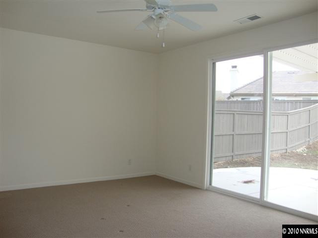 14020 Tagor Road Reno, NV 89521 - Photo 8 of 9 an empty room with a window