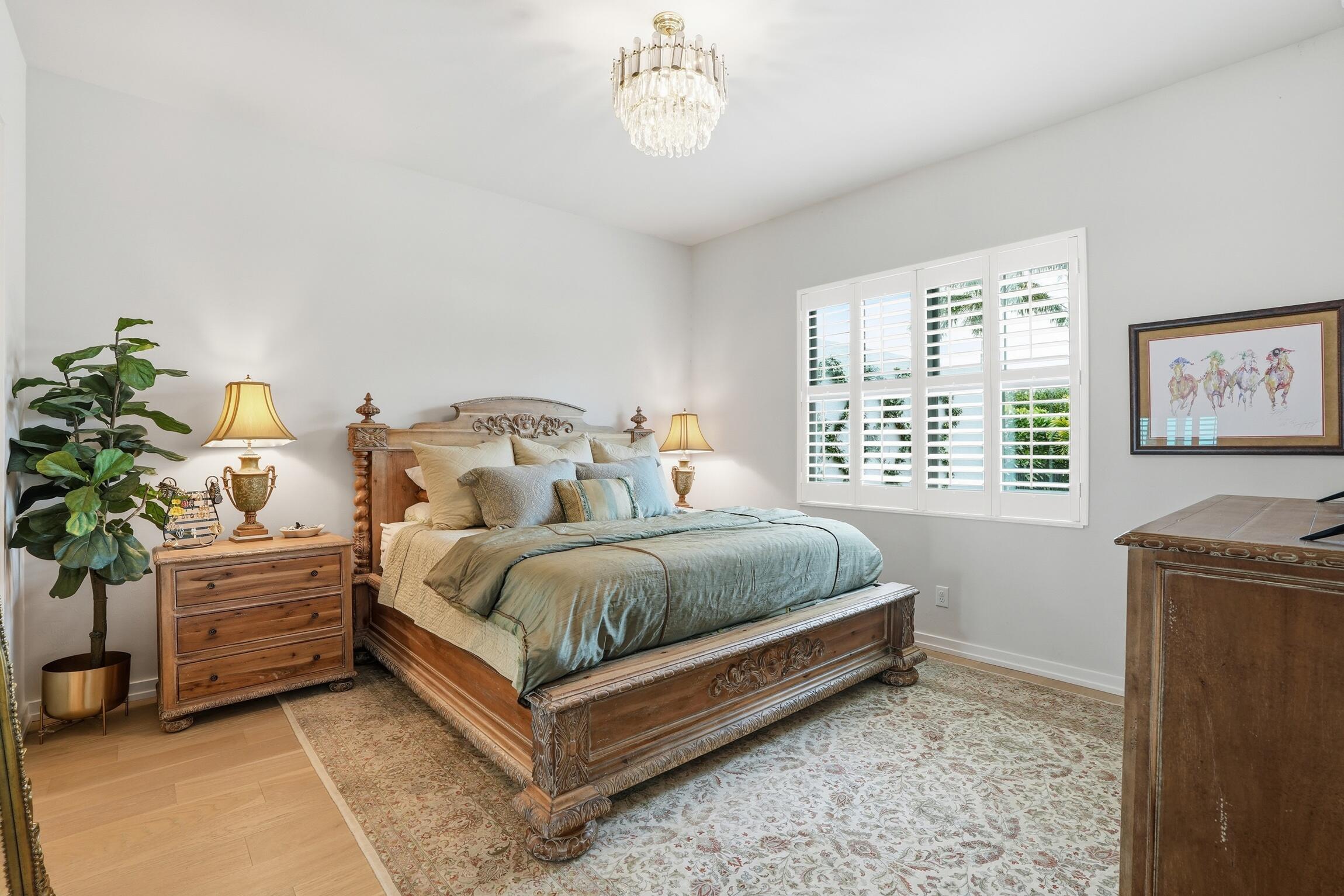 14708 Kingfisher Loop Naples, FL 34120 - Photo 19 of 42 a bedroom with bed and a window