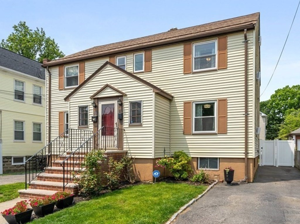 33 Bromfield Street, Unit 33 Watertown, MA 02472 - Photo 2 of 21 a view of a house with a yard and plants